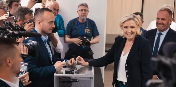  French parliamentary polls close with high turnout, exit poll indicates far-right tops vote share