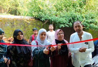 Chief Guest Anjum Parveen cuts the ribbon for the new building. Speakers emphasize the role of parents, discipline, and a positive home environment in shaping a child's future.